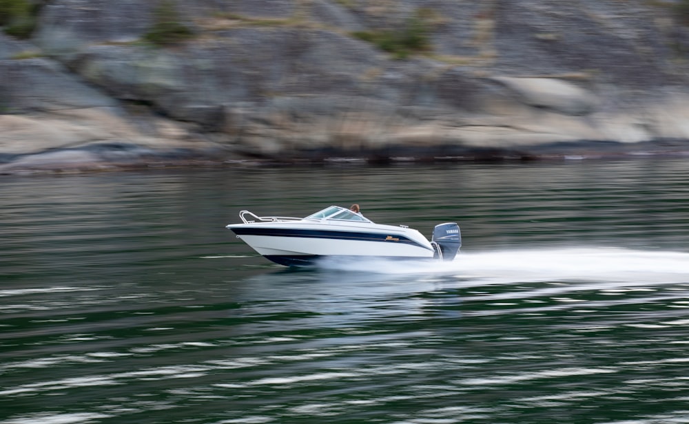Boat owner performing quick engine check between trips